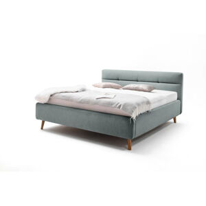 Světle modrá čalouněná dvoulůžková postel s úložným prostorem s roštem 140x200 cm Lotte - Meise Möbel