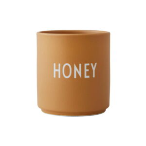 Hořčicově žlutý porcelánový hrnek Design Letters Favourite Honey